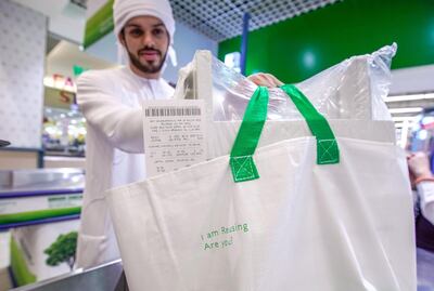 Abu Dhabi, United Arab Emirates, March 10, 2020. 
Lulu Hypermarket going plastic bag free and cleanliness-conscious to combat the Covid-19 outbreak.  Rashid Awad checking out using  reusable grocery bags.
Victor Besa / The National
Section:  NA
Reporter:  Haneen Dajani