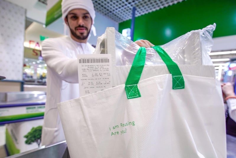 Abu Dhabi, United Arab Emirates, March 10, 2020. Lulu Hypermarket going plastic bag free and cleanliness-conscious to combat the Covid-19 outbreak.  Rashid Awad checking out using  reusable grocery bags.Victor Besa / The NationalSection:  NAReporter:  Haneen Dajani