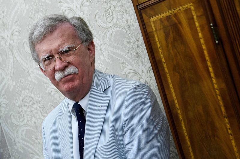National Security Advisor John Bolton waits for a meeting between Dutch Prime Minister Mark Rutte and US President Donald Trump in the Oval Office of the White House on July 2, 2018 in Washington, DC. / AFP / Brendan Smialowski
