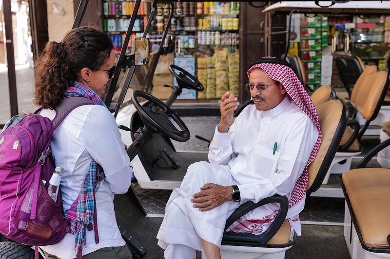 Sami Nawar from the Saudi Ministry of Culture gives a tour of historic Jeddah to Reem Philby. Mr Nawar grew up in the area and is an expert on the redevelopment of the old city