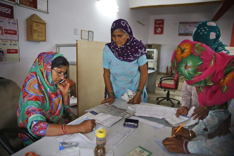 Sreeja Berwal, who is from the southern state of Kerala, works in a rural bank in the village of Sorkhi.