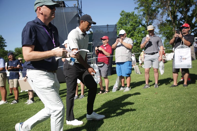 Tiger Woods makes his way to the 13th hole during a practice round for the PGA Championship at Southern Hills Country Club. AP