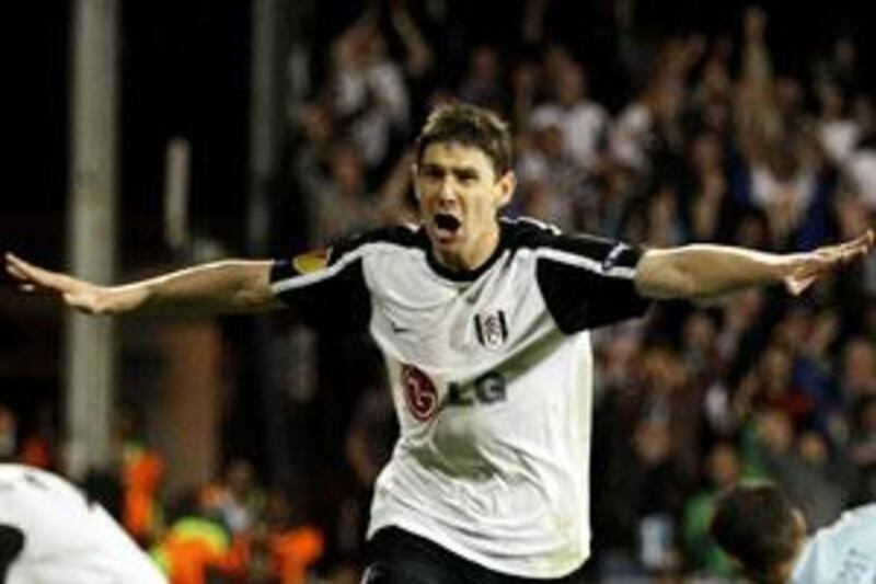 Fulham's Zoltan Gera celebrates after scoring against Hamburg in the second-leg semi-final.