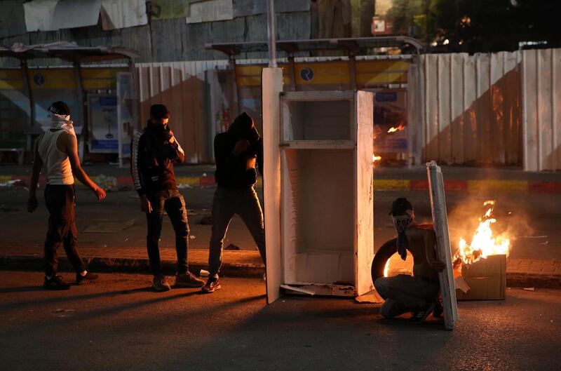 Palestinian protesters in the West Bank city of Hebron, where they clashed with Israeli troops. EPA