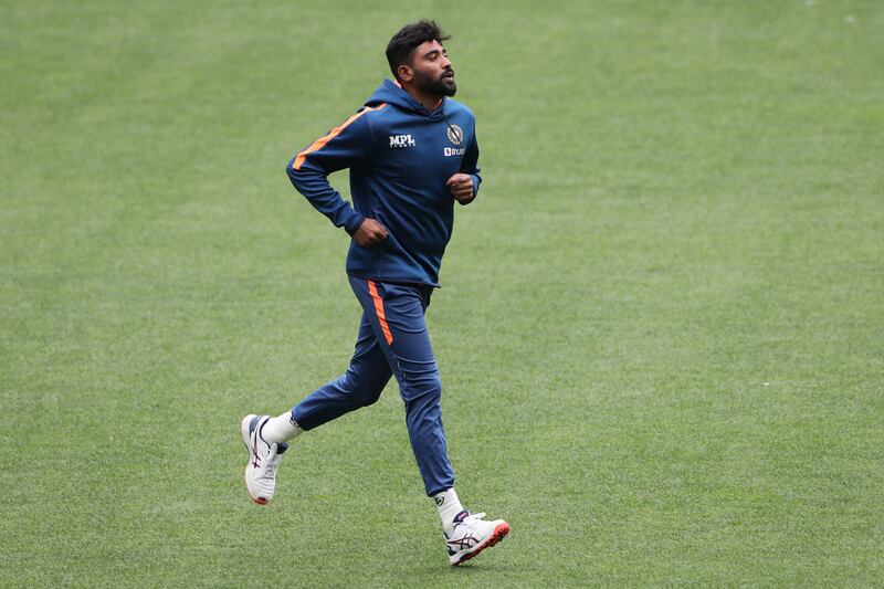 Mohammed Siraj runs before the start of a practice session at the Melbourne Cricket Ground. AFP