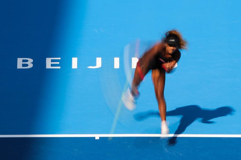 Naomi Osaka serves during a match in the China Open in Beijing. Lintao Zhang/Getty Images