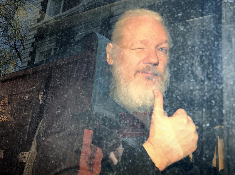 WikiLeaks founder Julian Assange arrives at the Westminster Magistrates Court, after he was arrested  in London, Britain, April 11, 2019. Picture taken April 11, 2019. REUTERS/Hannah McKay/File Photo  SEARCH "POY DECADE" FOR THIS STORY. SEARCH "REUTERS POY" FOR ALL BEST OF 2019 PACKAGES. TPX IMAGES OF THE DAY