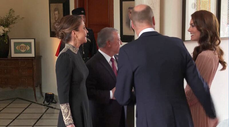 King Abdullah and Queen Rania greet Britain's Prince William and his wife Kate