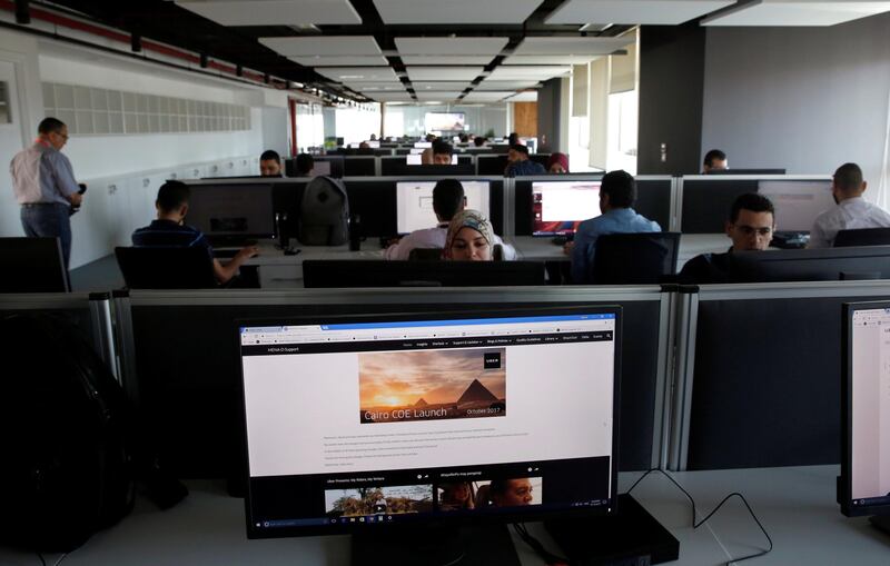 Employees work inside Uber's Centre of Excellence (COE) office in Cairo, Egypt October 10, 2017. REUTERS/Amr Abdallah Dalsh