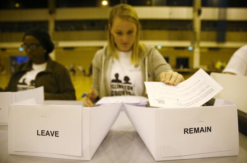 A workers counts ballots after polling stations closed in the Referendum on the European Union in Islington, London. Neil Hall / Reuters