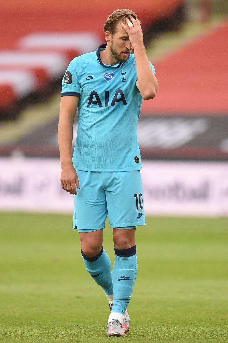 Tottenham striker Harry Kane reacts after blazing a free-kick over the bar. AFP
