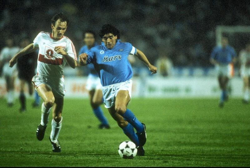 Diego Maradona, right, in action during the second leg of the Uefa Cup final against Stuttgart at the Neckarstadion in Stuttgart, Germany. Napoli won 5-4 on aggregate. Getty Images