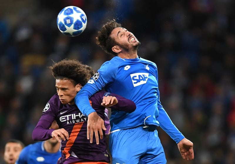 Sane, left, and Hoffenheim's Ishak Belfodil vie for the ball. AFP