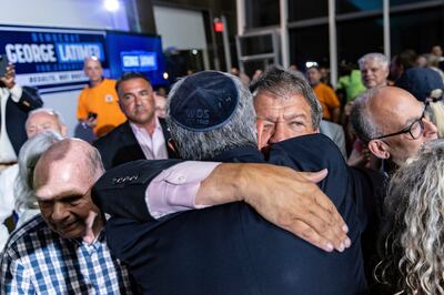Westchester County Executive George Latimer embraces a supporter at his election night party on June 25 in White Plains, New York. AP 