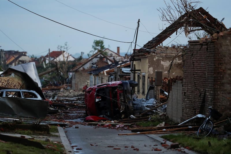 Damaged cars and houses in Moravska Nova Ves, Czech Republic, after a tornado swept through the village. Reuters