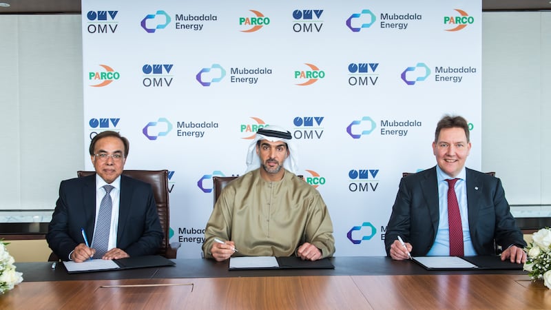 From left, Parco's Shahid Khan, Mubadala Energy's Mansoor Al Hamed and OMV's Martijn van Koten at the signing ceremony. Source: Mubadala Energy