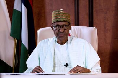In this photo released by the Nigeria State House, Nigeria's President Muhammadu Buhari looks on during a broadcast to the Nation at the Presidential palace in Abuja, Nigeria, Monday, Aug. 21, 2017. Nigeria's President Muhammadu Buhari said his government will reinvigorate its campaign against the Islamic extremist insurgency in the country's northeast as he spoke to the nation for the first time Monday after returning from London where he spent more than three months for medical treatment. (Bayo Omoboriowo/Nigeria State House via AP)