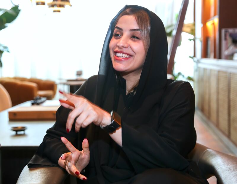 Sheikha Al Mheiri works at a mall in Abu Dhabi earning Dh11,400 ($3,100) per month, which she said is low by Emirati standards. Victor Besa / The National