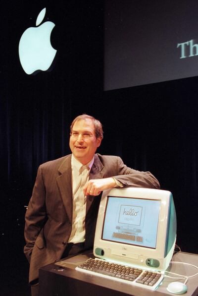 Steve Jobs, then interim chief executive of what was still known as Apple Computer, showing off the original iMac. AFP