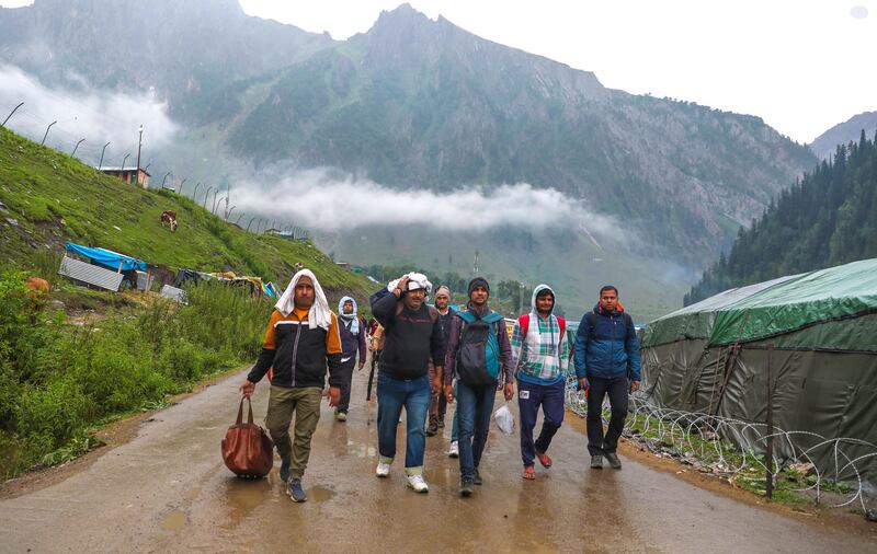 Pilgrims walk towards the Amarnath holy cave along the Baltal route in Kashmir. EPA 