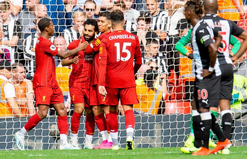 Liverpool's Mohamed Salah celebrates scoring. EPA