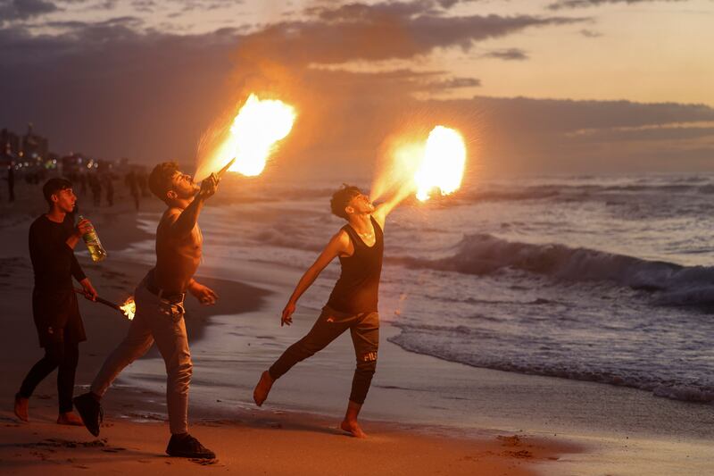 Many of Palestine's fire breathers find inspiration for their dangerous but spectacular performances online and hone their skills after watching videos.