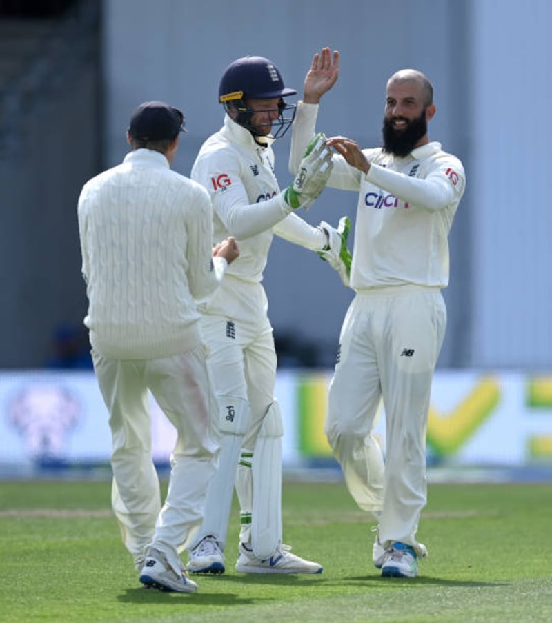 England bowler Moeen Ali celebrates dismissing Mohammed Shami of India. Getty