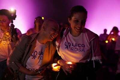 Cancer patients attend a ceremony marking the national campaign Pink October next to the Christ the Redeemer statue in Rio de Janeiro. Reuters