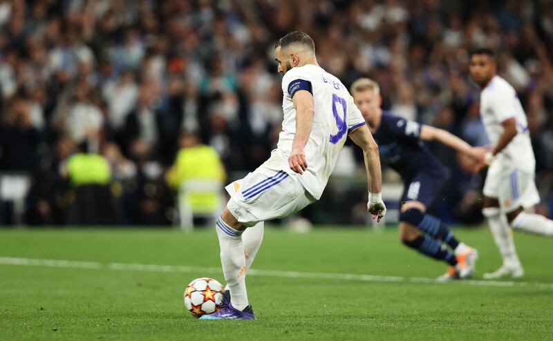  Karim Benzema scores the winning spot kick. Getty