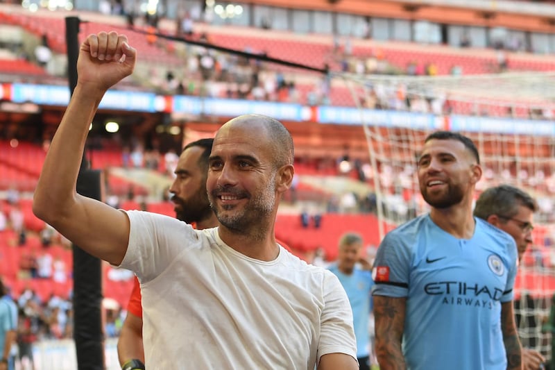 epa06929524 Manchester City manager Pep Guardiola celebrates after winning the FA Community Shield match against Chelsea at Wembley Stadium in London, Britain, 05 August 2018.  EPA/FACUNDO ARRIZABALAGA EDITORIAL USE ONLY. No use with unauthorized audio, video, data, fixture lists, club/league logos or 'live' services. Online in-match use limited to 75 images, no video emulation. No use in betting, games or single club/league/player publications.