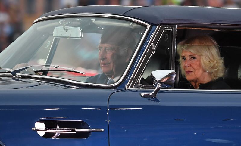 Prince Charles and Camilla arrive. AFP