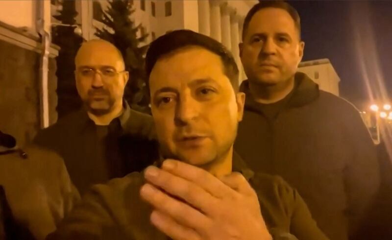 A still from a video posted on the Facebook account of Mr Zelenskyy in February 2022 shows him speaking to camera in Kyiv after Russia's invasion. He said 'we are all here'. AFP