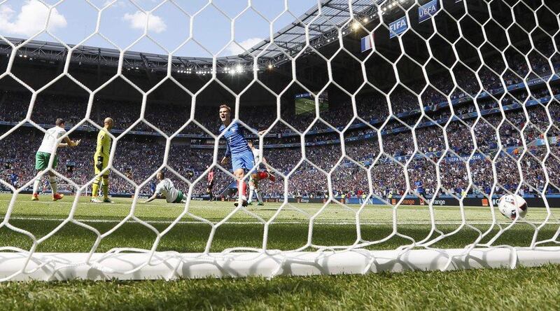 Antoine Griezmann scores his and France’s second goal against Republic of Ireland. Jason Cairnduff / Reuters