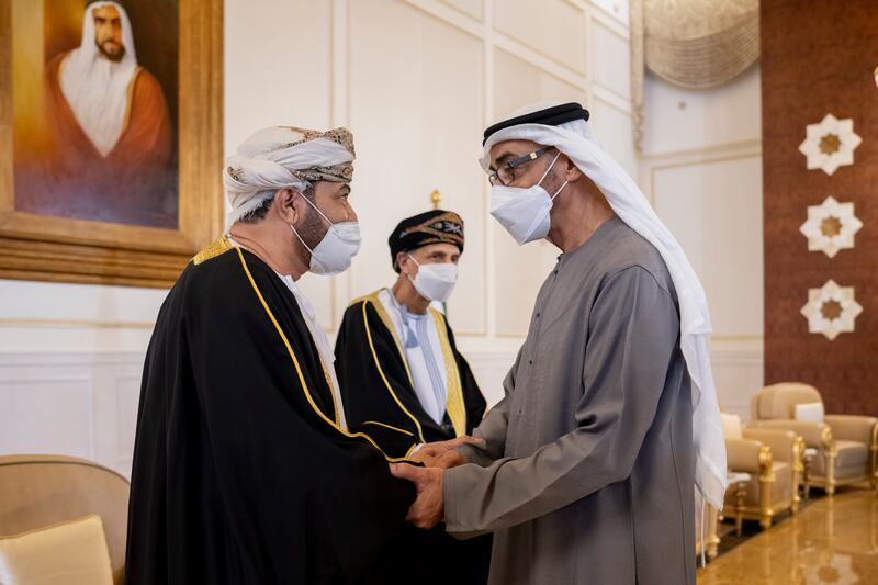 A delegate accompanying the Sultan of Oman, not pictured, offers condolences to Sheikh Mohamed on the death of his brother, Sheikh Khalifa, on May 14, 2022. Photo: Ministry of Presidential Affairs