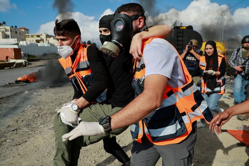 Emergency services on duty at a West Bank protest against Israeli occupation near Ramallah. Reuters
