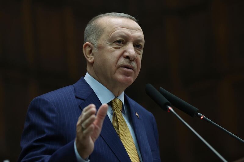 Turkey's President Recep Tayyip Erdogan speaks to his ruling party's lawmakers, in Ankara, Turkey, Wednesday, Dec. 23. 2020. Turkeyâ€™s president has lashed out against the European Court of Human Rights after its ruling that Turkey must immediately release a prominent Kurdish politician. Speaking to his ruling party lawmakers Wednesday, Turkish President Recep Tayyip Erdogan called imprisoned politician Selahattin Demirtas a â€œterroristâ€ and accused the European court of â€œdefending a terrorist.â€ (Turkish Presidency via AP, Pool)