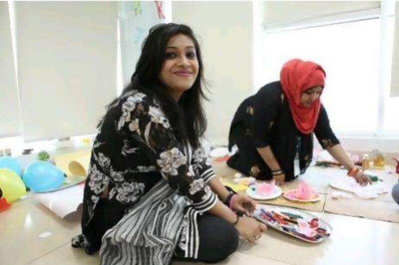 :Lutfa Akhter, 22, who organised the children’s play area at Al Hosn’s volunteers fair, says giving up her time has also helped her to improve her social skills.