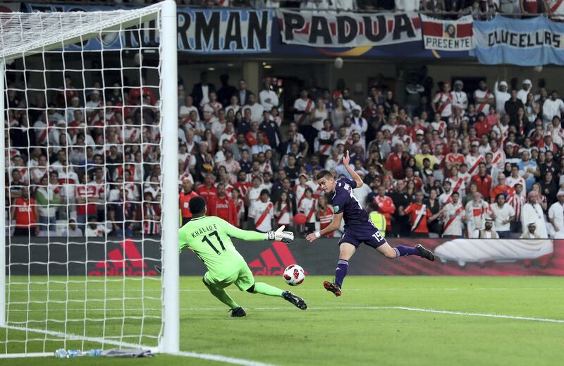 Al Ain, United Arab Emirates - December 18, 2018: River Plate's Santos Borre scores his second during the game between River Plate and Al Ain in the Fifa Club World Cup. Tuesday the 18th of December 2018 at the Hazza Bin Zayed Stadium, Al Ain. Chris Whiteoak / The National