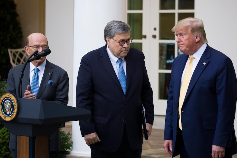 Commerce Secretary Wilbur Ross, left, Attorney General William Barr, and President Donald Trump turn to leave after speaking about the 2020 census in the Rose Garden of the White House, Thursday, July 11, 2019, in Washington. (AP Photo/Alex Brandon)