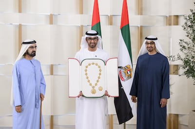 President Sheikh Mohamed and Sheikh Mohammed bin Rashid, Vice President and Ruler of Dubai, present Dr Sultan Al Jaber, Cop28 President, with the Union Medal. Wam