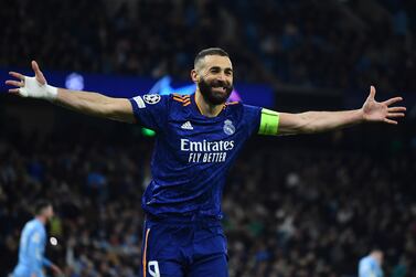 Real Madrid captain Karim Benzema  reacts after scoring for 3-4 during the UEFA Champions League semi final, first leg soccer match between Manchester City and Real Madrid in Manchester, Britain, 26 April 2022.   EPA / PETER POWELL