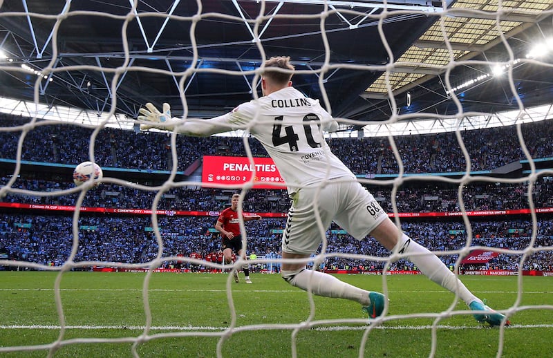 Manchester United's Rasmus Hojlund scores the winning penalty. AP