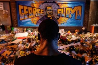 A man recites spoken word poetry at a makeshift memorial honouring George Floyd in Minneapolis earlier in the week. Reuters