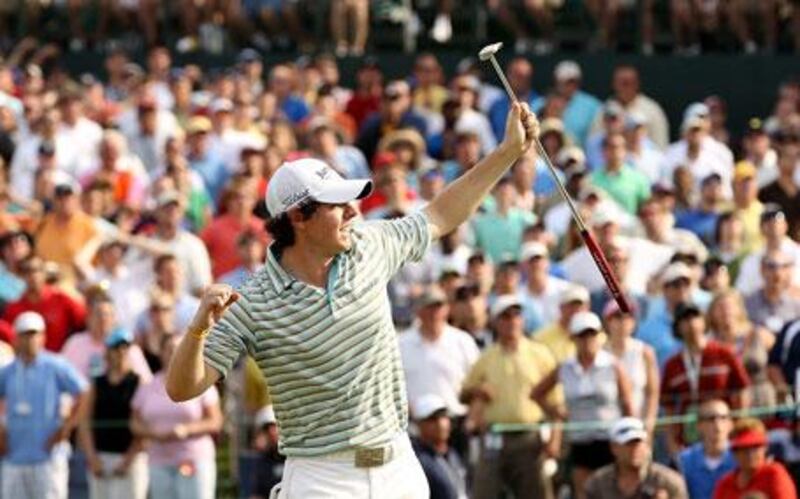 Rory McIlroy, of Northern Ireland, reacts after beating Phil Mickelson to win the Quail Hollow Championship in Charlotte.