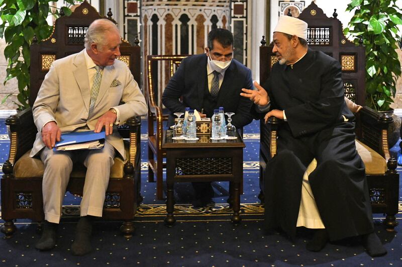 Egyptian Islamic scholar and the Grand Imam of Al Azhar mosque, Sheikh Ahmed Al Tayeb, right, meets Prince Charles, left, at the mosque in Cairo.  AFP