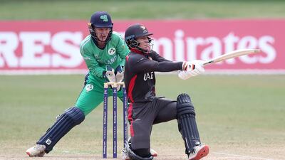 UAE batsman Kai Smith plays a shot as Joshua Cox of Ireland looks on during the ICC U19 Men's Cricket World Cup Plate Final at Queen's Park Oval on January 31, 2022. Photo: ICC