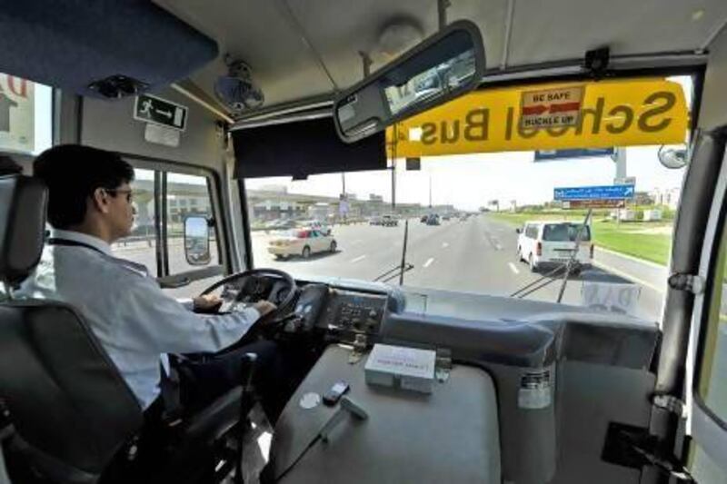 Rajeev Rajan, a bus driver, on Sheikh Zayed Road. Even when we stop to pick up children, drivers keep honking, he says. Charles Crowell / The National