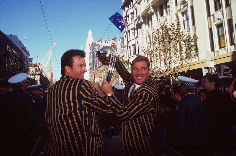 Australian captain Steve Waugh and vice captain Shane Warne during a ticker-tape parade through Melbourne, in celebration of the Australian cricket team's victory over Pakistan in the 1999 Cricket World Cup Final. Getty Images
