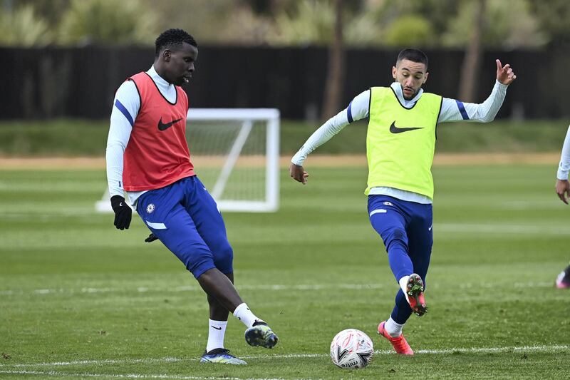 COBHAM, ENGLAND - APRIL 16:  Kurt Zouma and Hakim Ziyech of Chelsea during a training session at Chelsea Training Ground on April 16, 2021 in Cobham, England. (Photo by Darren Walsh/Chelsea FC via Getty Images)