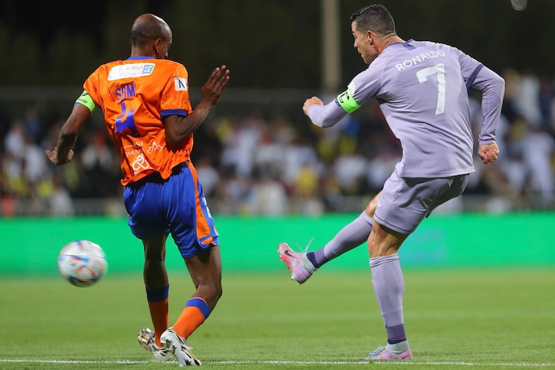 Cristiano Ronaldo attempts a shot at goal. AFP